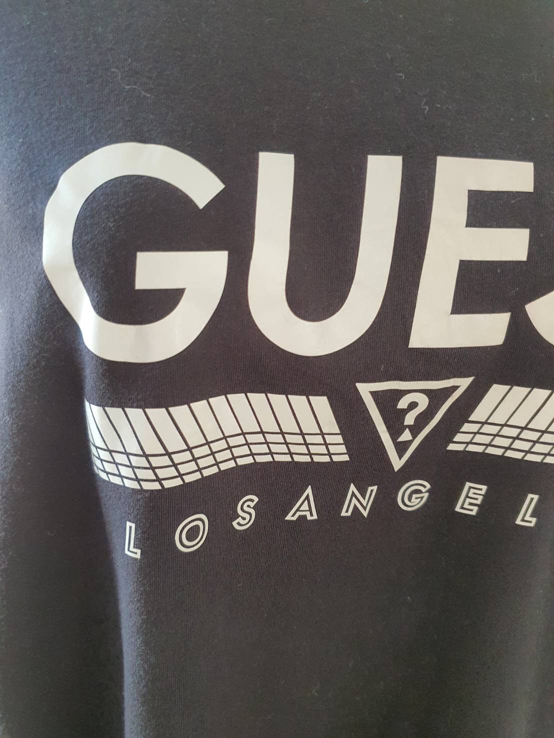 FF06075 เสื้อยืด สีดำ แขนยาว แบรนด์ Guess อก 44-46 นิ้ว
