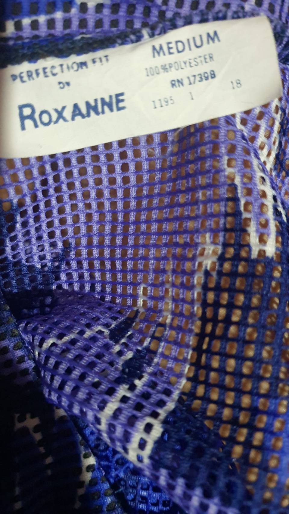 FF02833 เสื้อแฟชั่นมือสอง สีน้ำเงินอมม่วง แบรนด์ roxanne อก 43 นิ้ว
