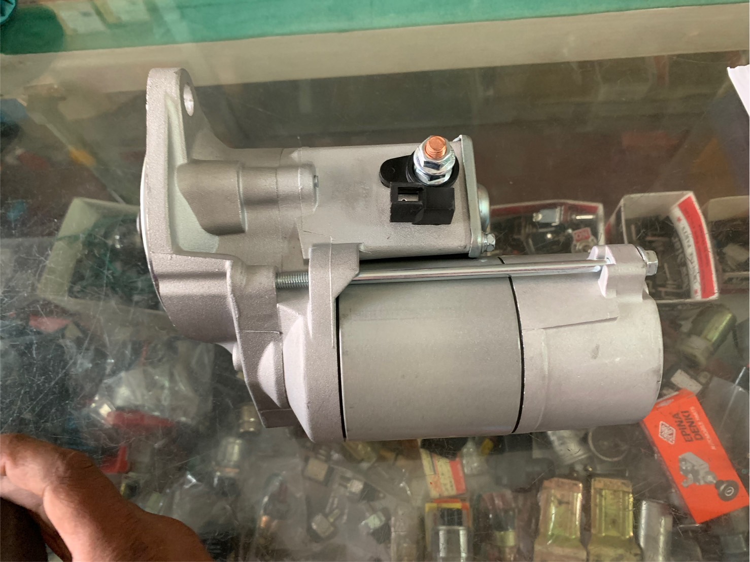 มอเตอร์สตาร์ท DMAX ตัวแรก ปี 2003 แบบ ND 12V 9 ฟัน ตะเกียบนอก