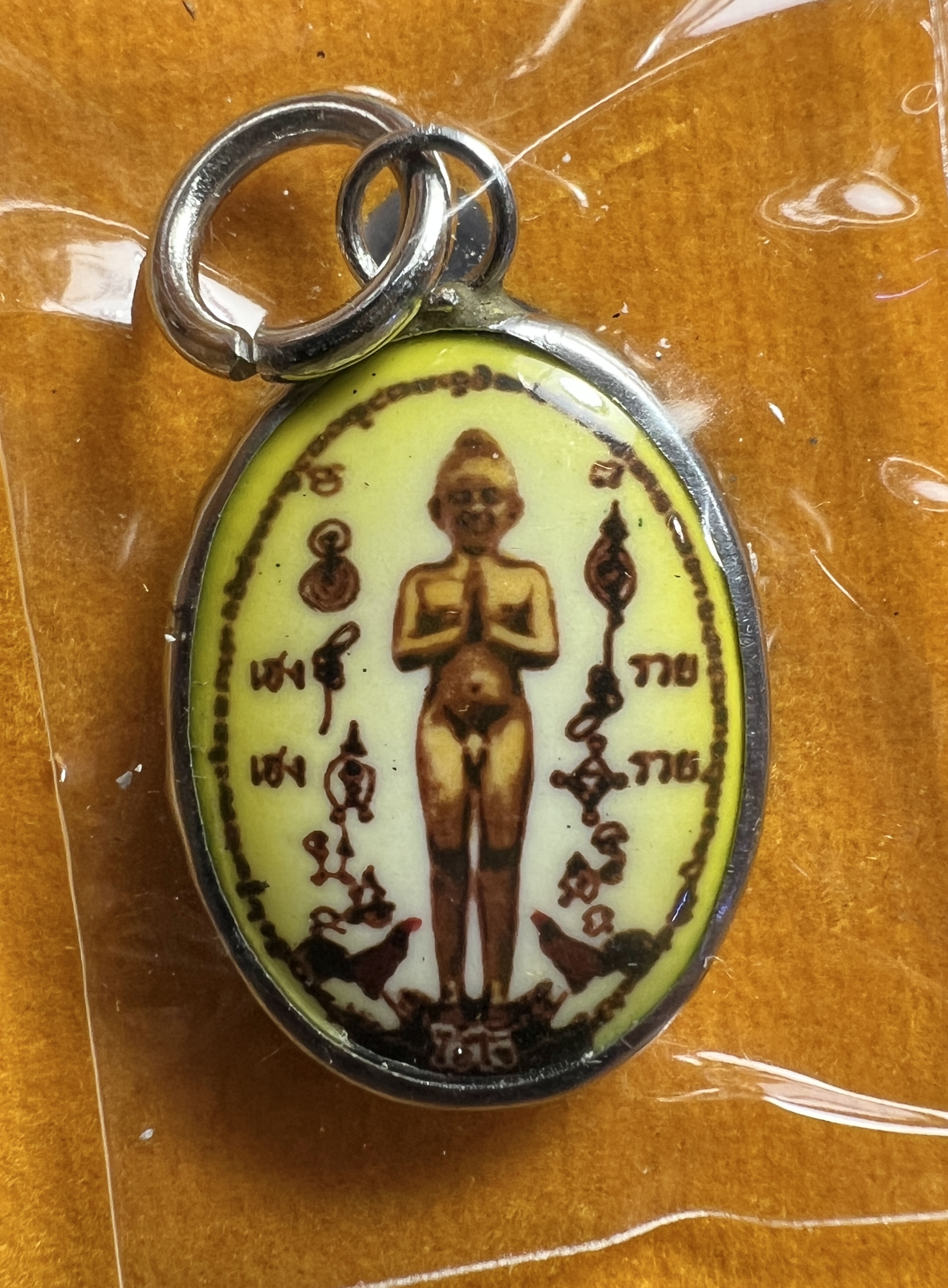 ล็อกเก็ตไอ้ไข่ (เลี่ยมแสตนเลจ, สีเหลือง) Ai-Kai locket (Stainless cover, Yellow color) SKU-02675