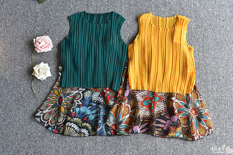 ชุดเสื้อกล้ามเด็กสีเหลือง+กระโปรงลาย