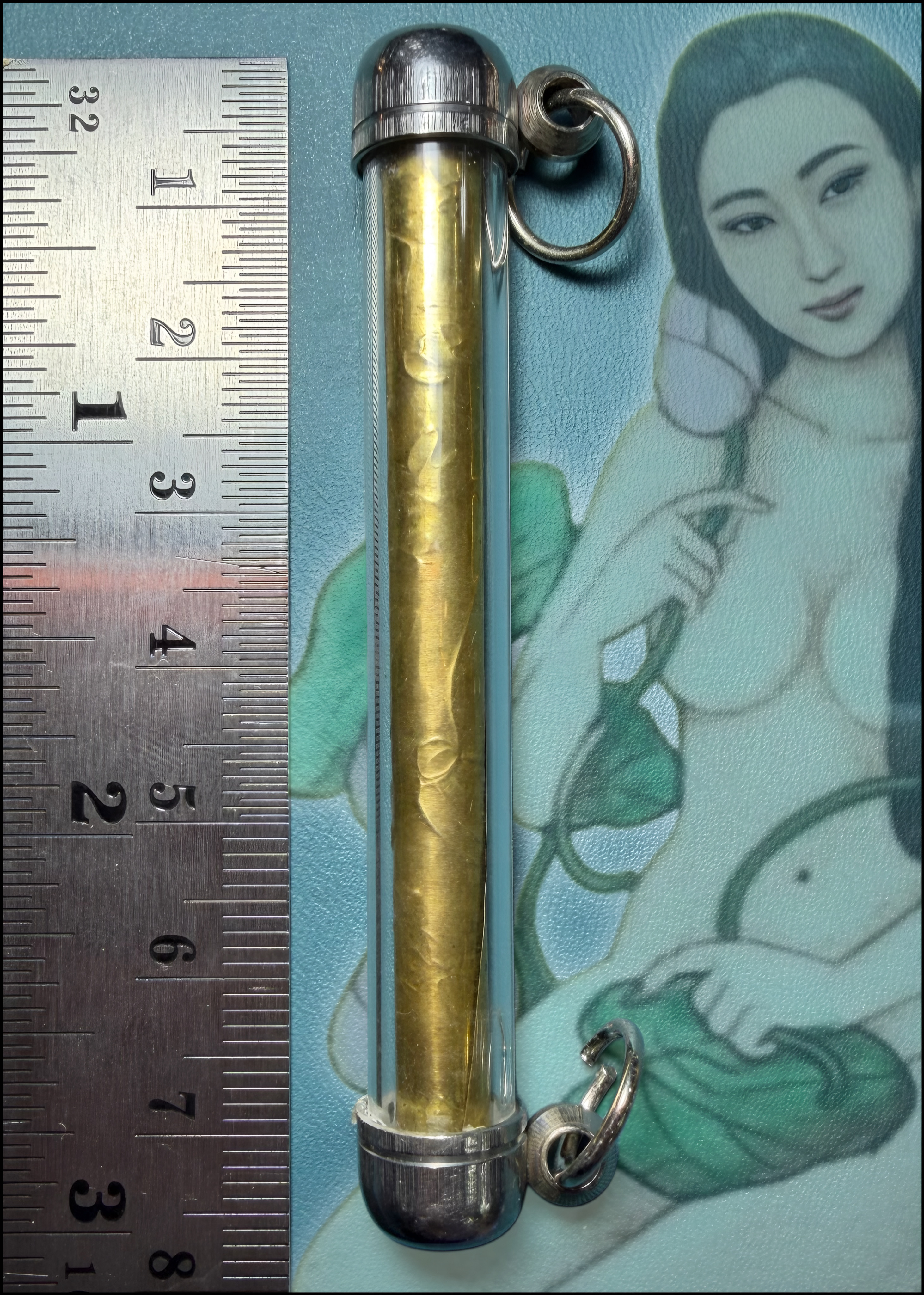 ตะกรุดมหาเสน่ห์บัวบังใบ (เนื้อทองเหลือง) Bua Bang Bai Charming Takrud. (brass material) SKU-04055