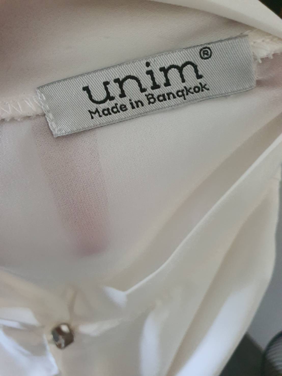 FF06560 เสื้อแฟชั่นแขนกุด มือสอง สีขาว unim อก 33 นิ้ว