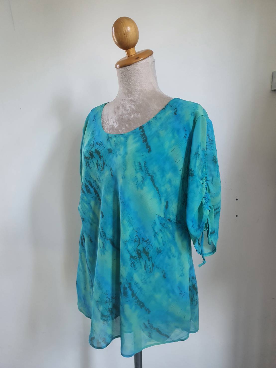 FF05265 เสื้อผ้ามือสอง สีฟ้าเขียว แบรนด์VOCCO