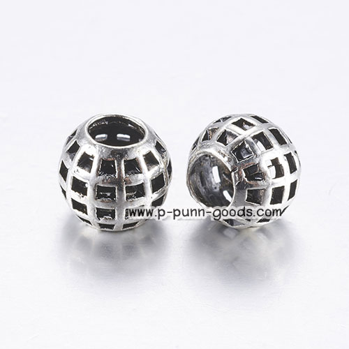 ลูกปัดฉลุลาย 10.5x9 มม. สีเงินโบราณ